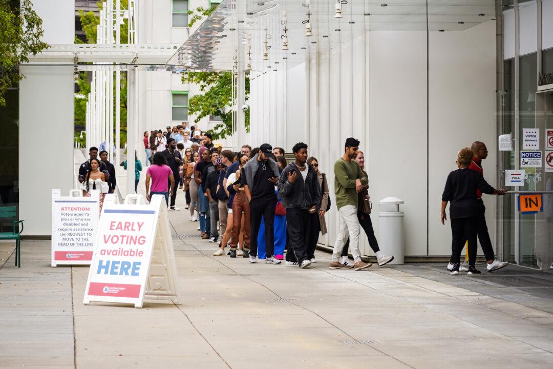 Voters line up outside a polling station to cast their ballots on the last day of early voting for the 2024 election, in Atlanta on Nov. 1, 2024. (Megan Varner/Getty Images)