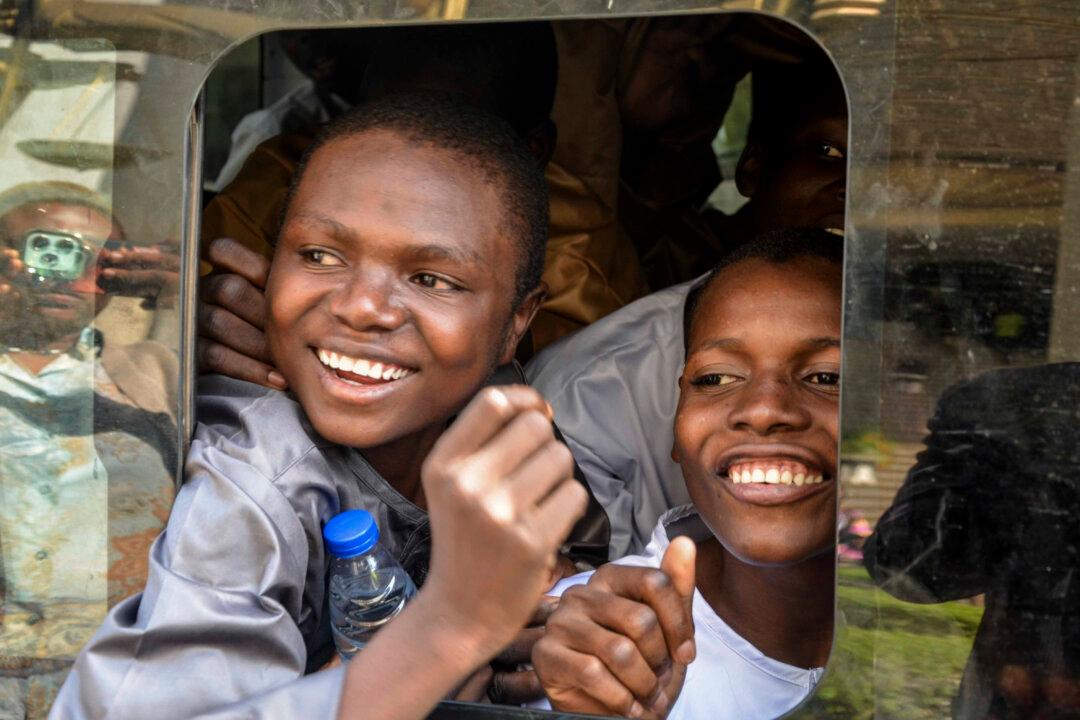 Children who had faced the death penalty for allegedly protesting against the country's cost of living crisis, are brought to a courtroom in Abuja, Nigeria, on Nov. 5, 2024. (Olamikan Gbemiga/AP Photo)