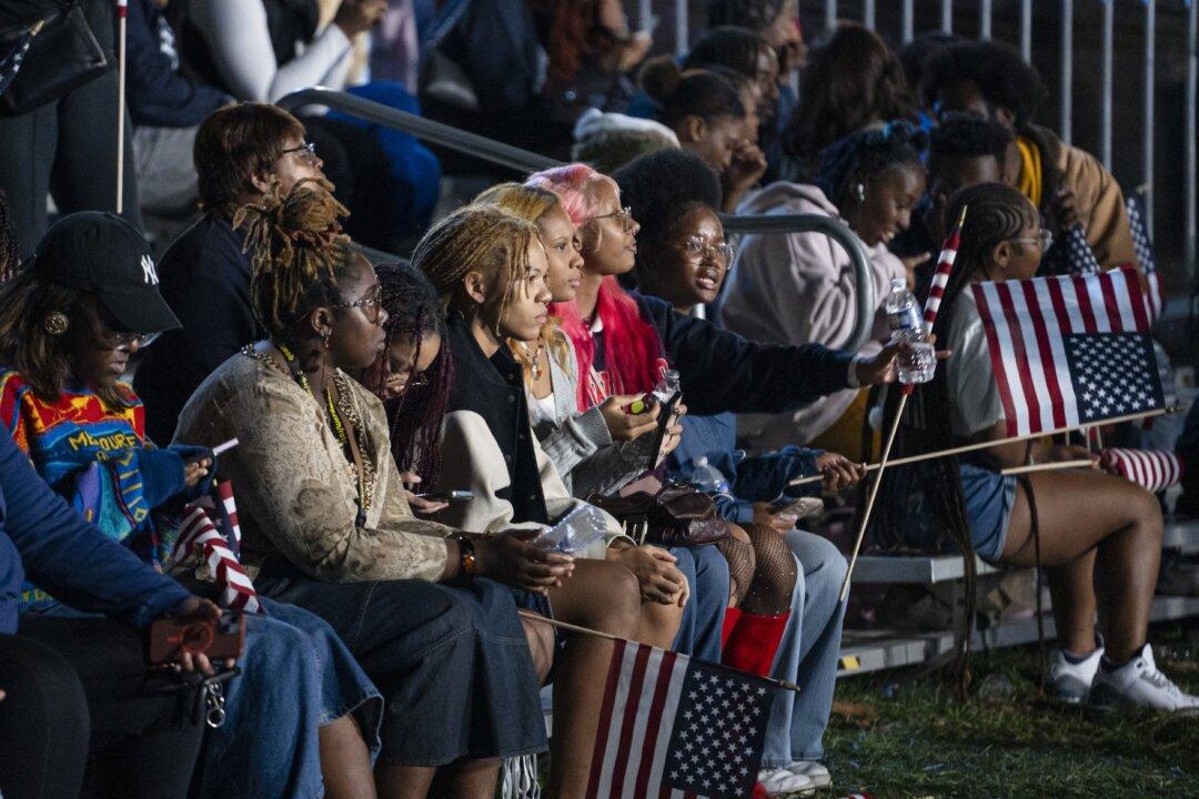 Supporters of Democratic presidential nominee Vice President Kamala Harris watch the election results at her election watch party at Howard University in Washington on Nov. 6, 2024. (Madalina Vasiliu/The Epoch Times)