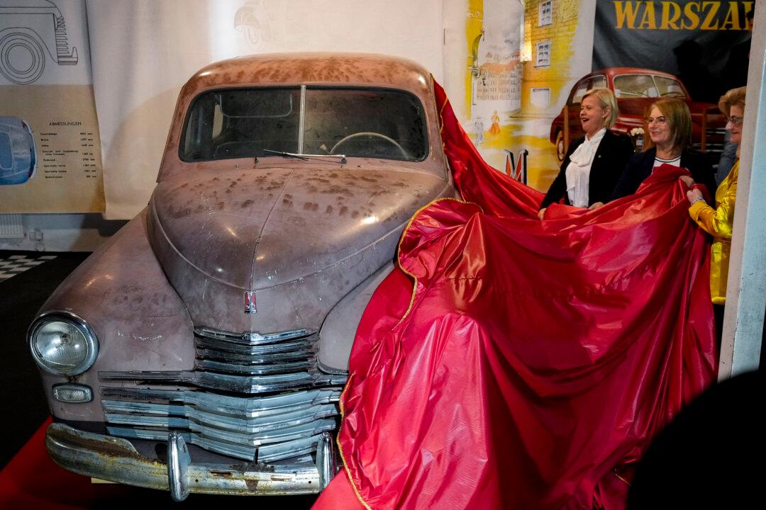 This Warszawa M-20 car with serial number 000001, based on a Soviet Union's model, was the first vehicle to leave a car factory in Poland after World War II, on Nov. 6, 1951 and 73 years later it goes on public display at a private museum in Otrebusy, central Poland, on Nov. 6, 2024. (Czarek Sokolowski/AP Photo)