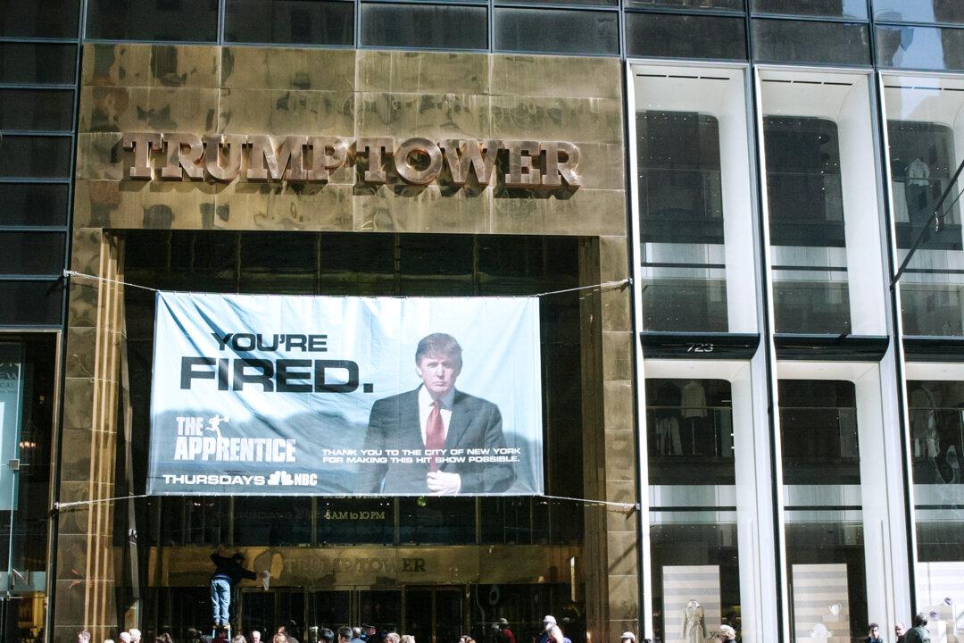 A sign with the words “You're Fired“ advertising the television show “The Apprentice” hangs at Trump Tower in New York City on April 15, 2004. (Peter Kramer/Getty Images)