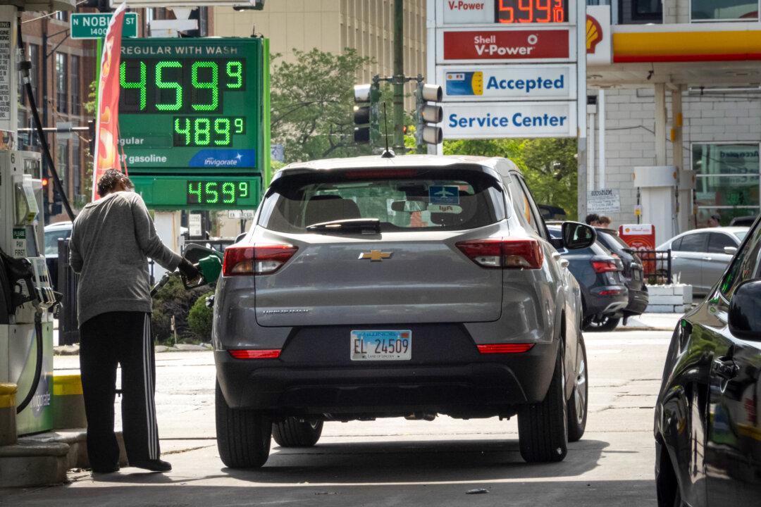 A sign displays prices at a gas station in Chicago on May 21, 2024. The current gas prices range between $3 and $4 per gallon. (Scott Olson/Getty Images)