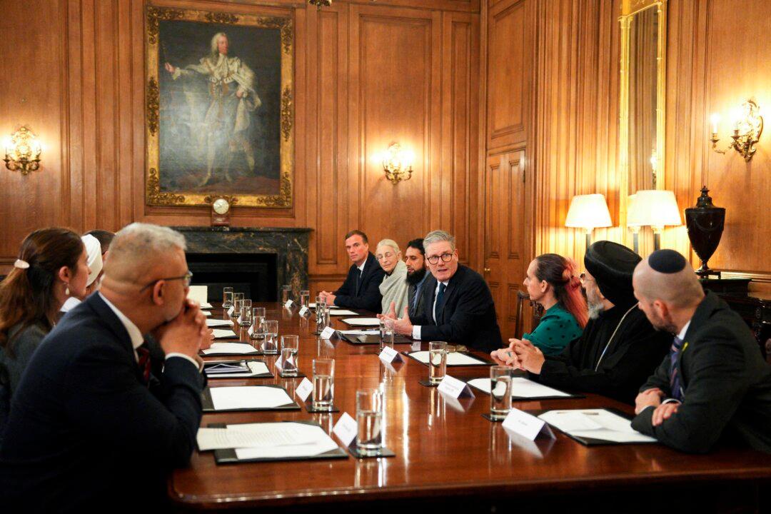 Britain's Prime Minister Keir Starmer speaks with religious leaders during a breakfast roundtable meeting organized by faith leaders as part of Inter Faith Week at 10 Downing Street, London, on Nov. 14, 2024. (Carl Court/AFP via Getty Images)