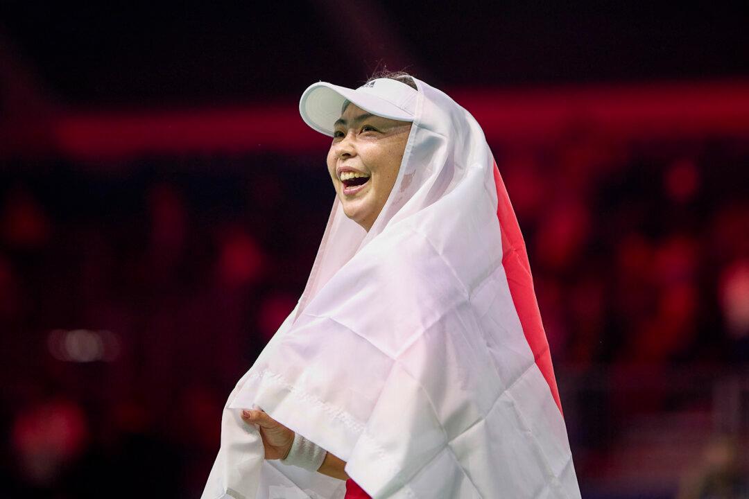 Eri Hozumi of Team Japan celebrates after winning the Billie Jean King Cup Finals group stage doubles match between Japan and Romania at Palacio de Deportes Jose Maria Martin Carpena in Malaga, Spain, on Nov. 14, 2024. (Fran Santiago/Getty Images for ITF)