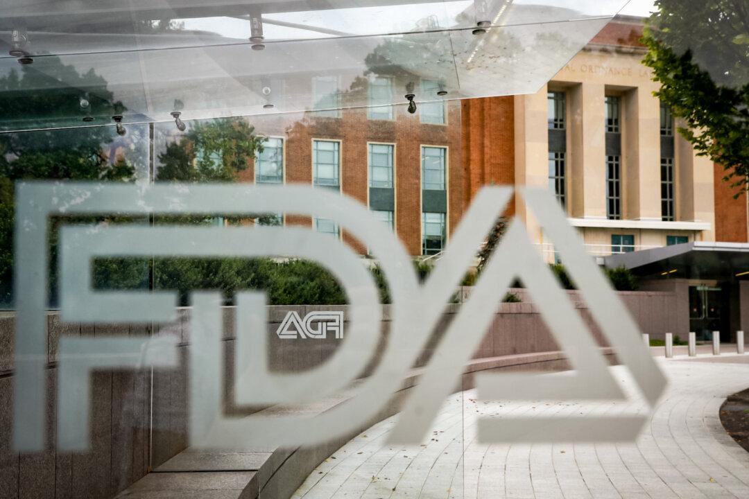 A Food and Drug Administration sign is seen through a bus stop at the U.S. Department of Health and Human Services in Silver Spring, Md., on Aug. 2, 2018. (Jacquelyn Martin/AP)