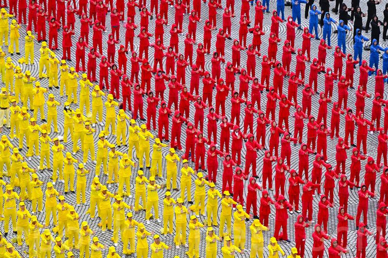 Falun Gong practitioners take part in a group exercise in Taipei, Taiwan, on Nov. 17, 2024. (Sung Pi-lung/The Epoch Times)