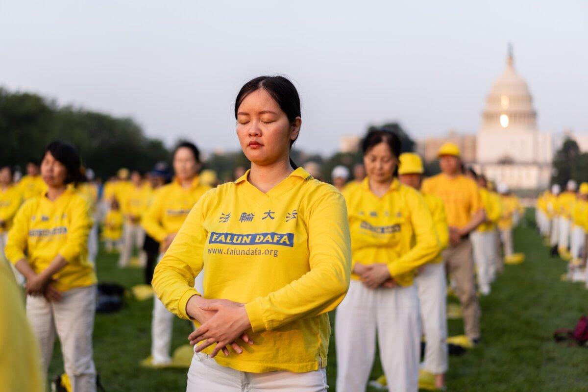 Falun Gong practitioners at the National Mall in Washington on July 20, 2023. (Samira Bouaou/The Epoch Times)