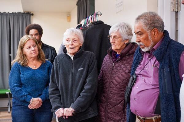 Marilyn Pierce (2nd L) speaks at Middletown Warming Station in Middletown, N.Y., on Nov. 24, 2024. (Cara Ding/The Epoch Times)