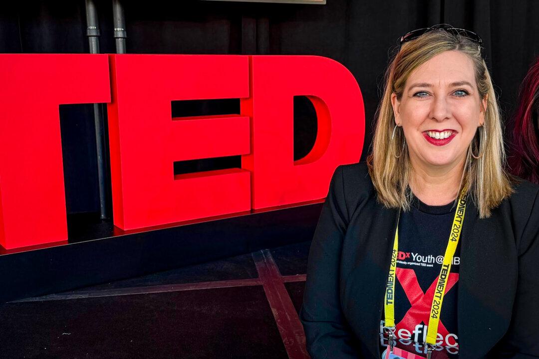 Suzan Brandt of Birmingham, Ala., appears on the stage of a TEDNext event on Oct. 21, 2024. (Courtesy of Suzan Brandt)