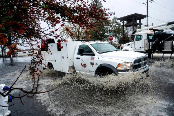 A truck crosses a flooded road in Santa Rosa, Calif., on Nov. 20, 2024. (Noah Berger/AP Photo)