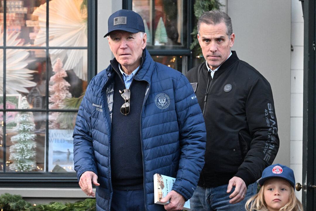 Joe Biden, Hunter Biden, and Beau Jr., in Nantucket, Mass., on Nov. 29, 2024. (Craig Hudson/Reuters)