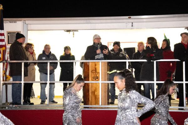 Pastor Joe Nieves speaks during the holiday parade and tree lighting ceremony in the town of Wallkill, N.Y., on Nov. 30, 2024. (Larry Dye/The Epoch Times)