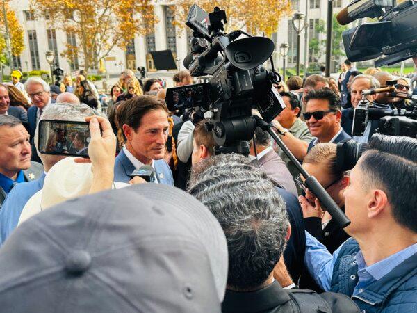 District Attorney Nathan Hochman speaks to reporters and supporters after his swearing in ceremony at the Los Angeles Hall of Justice on Dec. 3. (Jill McLaughlin/The Epoch Times)