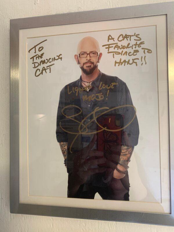 An autographed picture of Jackson Galaxy, cat behaviorist and TV show host. (Helen Billings/The Epoch Times)