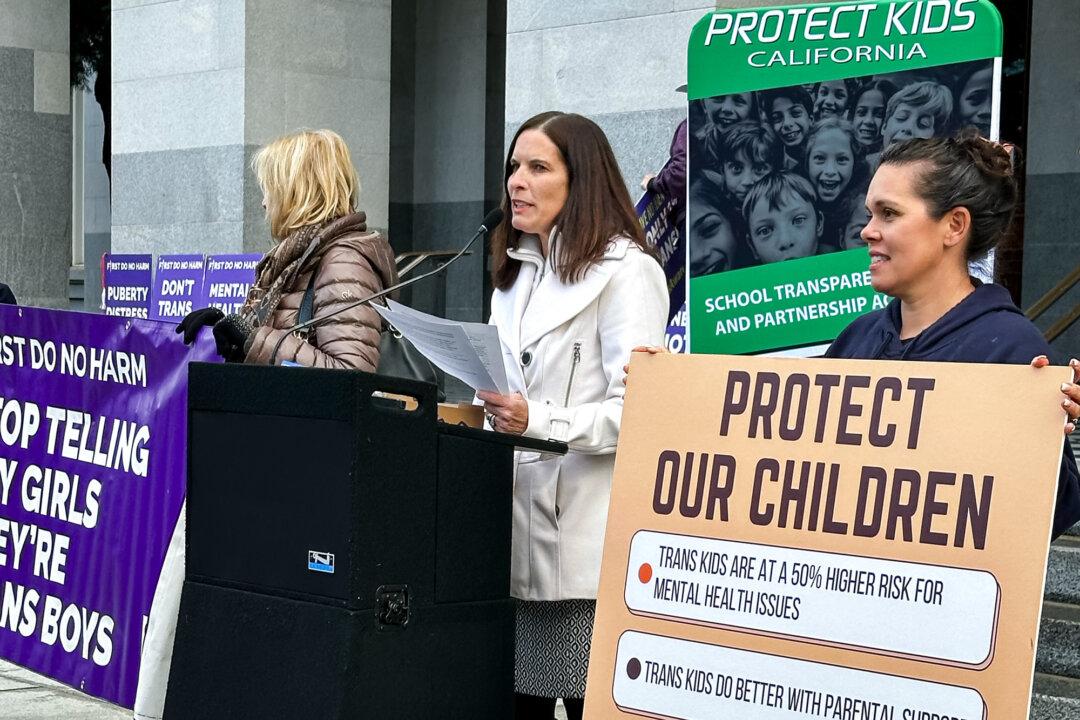 Erin Friday (C), an attorney on the executive committee for Protect Kids California, speaks at a press conference in Sacramento, Calif., on Jan. 3, 2024. (Courtesy of Jay Reed, Protect Kids California)