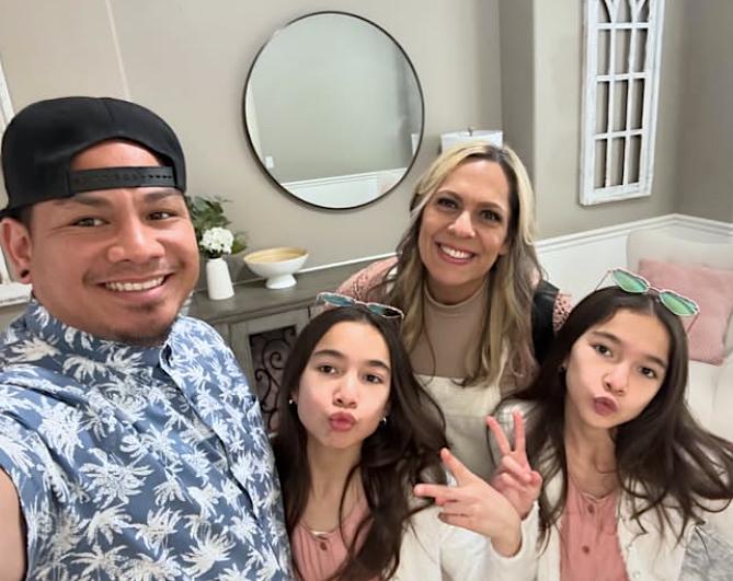 Coree Ray and Melvin Galang with their twin daughters in their home in Idaho Falls, Idaho, on March 32, 2024. (Courtesy of Coree Ray)