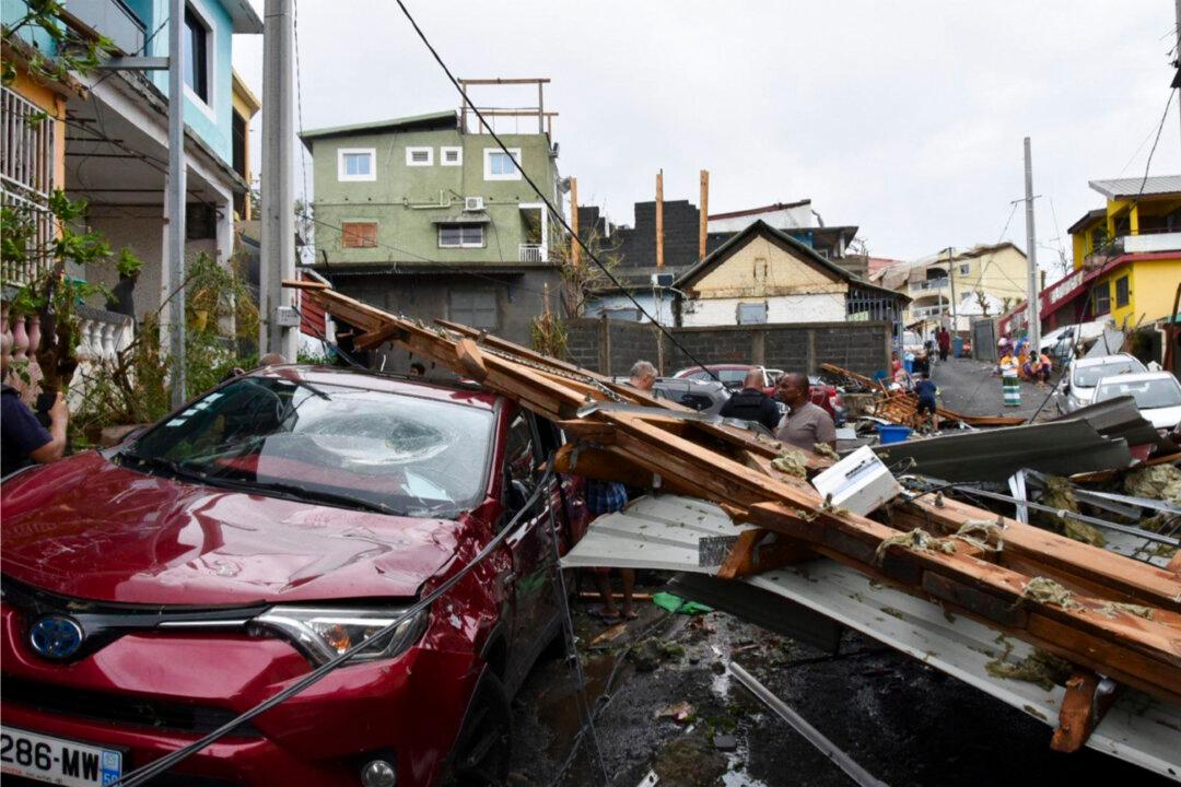 This photo shows debris in a street in the Indian Ocean French territory of Mayotte on Dec. 17, 2024. (Ministere de l'Interieur/DICOM via AP)