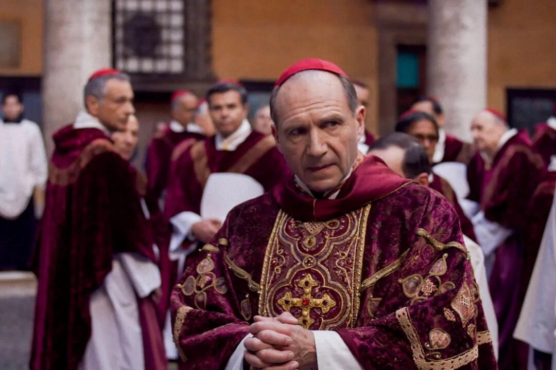 Cardinal Lawrence (Ralph Fiennes, center) is in charge of the proceedings, in "Conclave." (Focus Features)