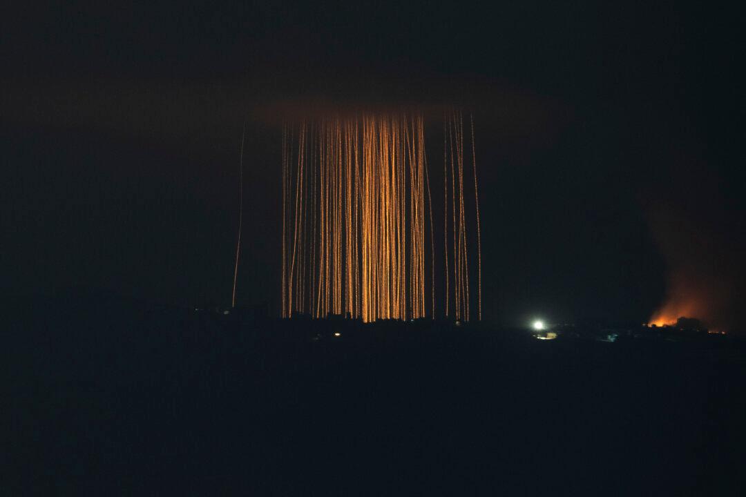 Israeli shelling hits an area in southern Lebanon as seen from northern Israel, on Sept. 30, 2024. (AP Photo/Leo Correa)