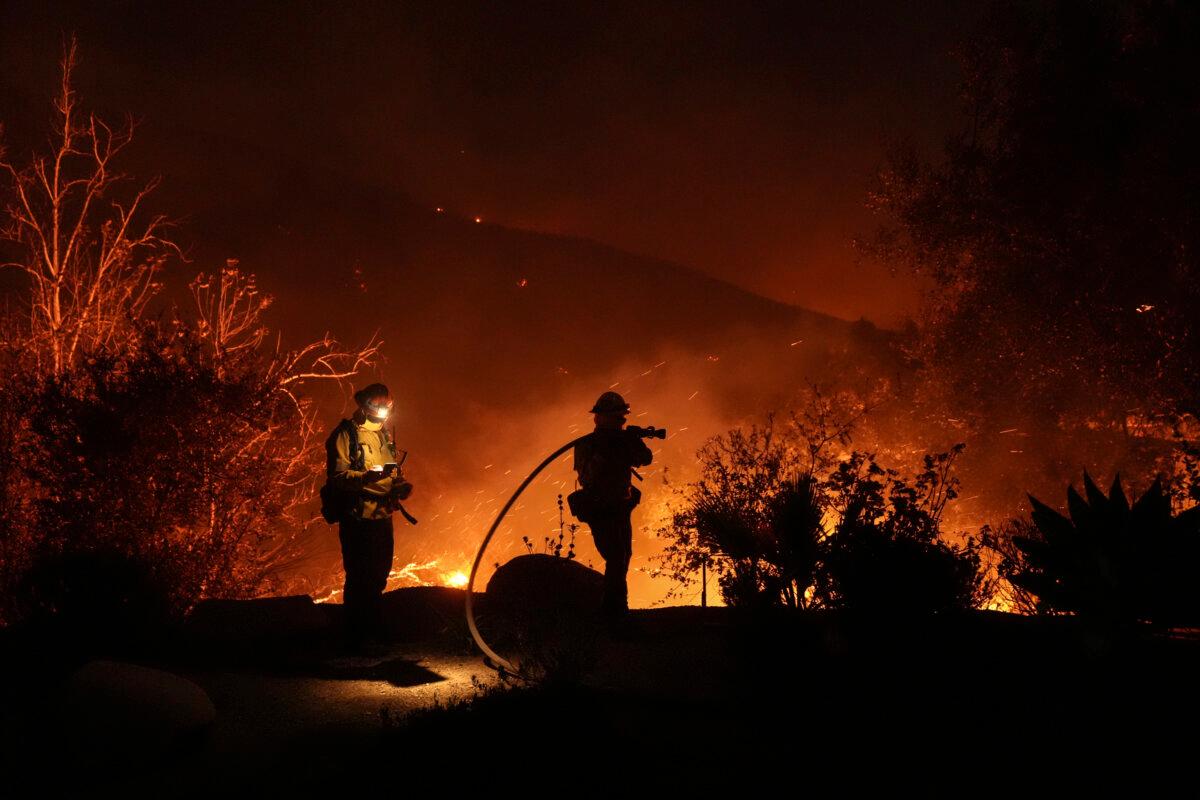 Firefighters battle the Franklin Fire in Malibu, Calif., on Dec. 10, 2024. (Jae C. Hong/AP Photo)