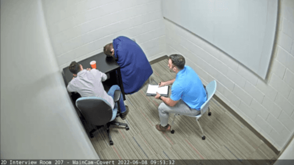 Nicholas Roske, center, is interrogated in Montgomery County, Md., on June 8, 2022. (Nicholas Roske via The Epoch Times)