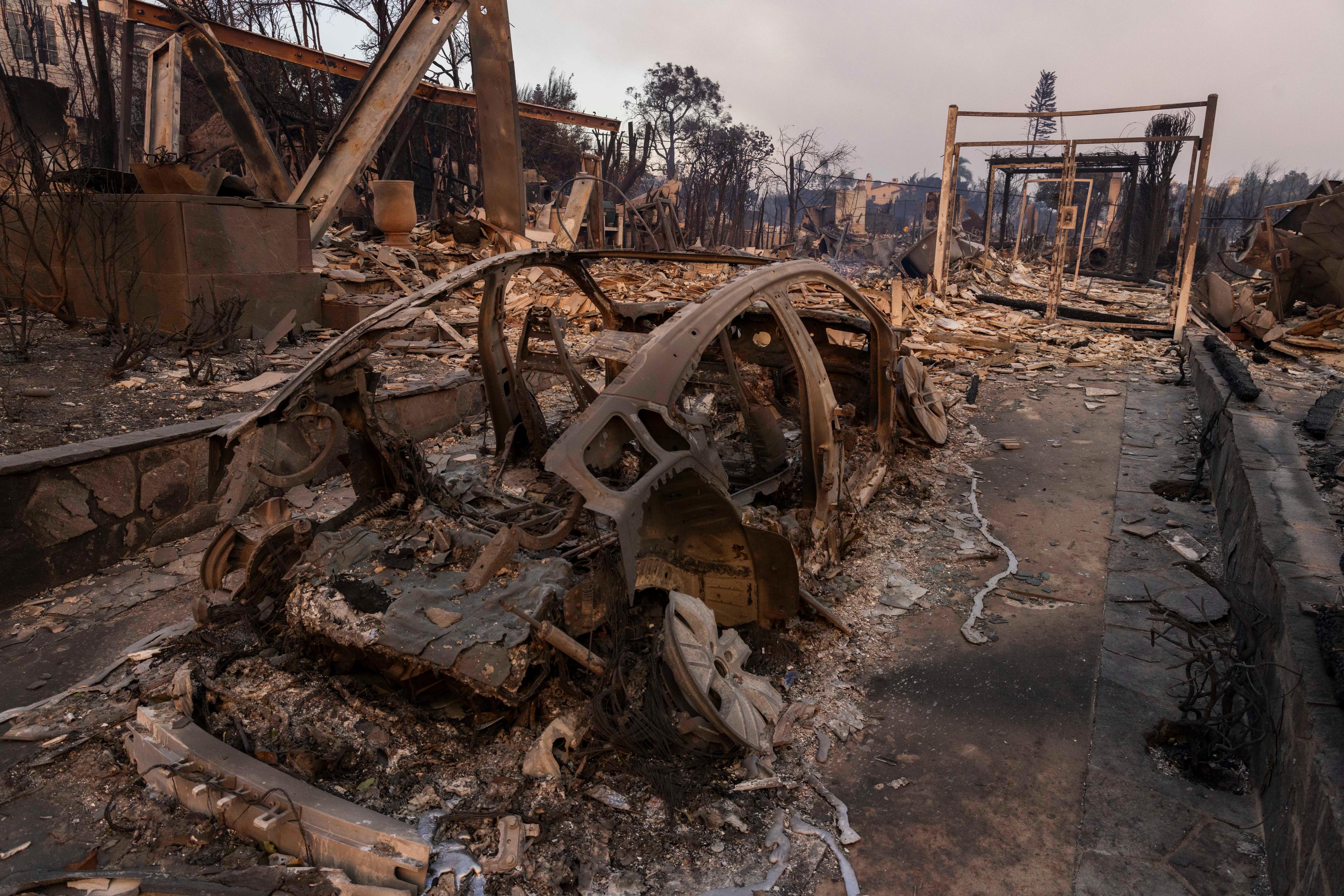 Los Angeles Fires Push Crews to Limits as Critics Blame Government Policy