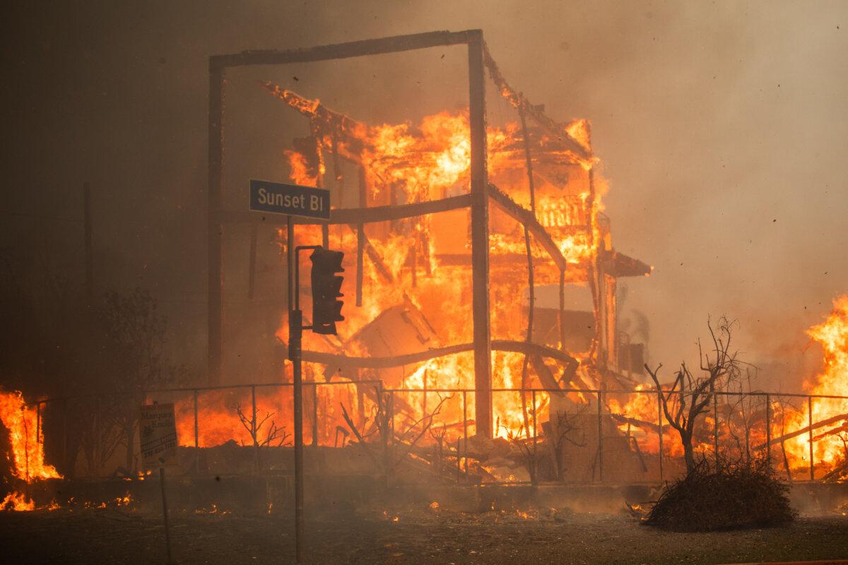 Flames from the Palisades Fire burn a building at Sunset Boulevard amid a powerful windstorm in the Pacific Palisades neighborhood of Los Angeles on Jan. 8, 2025. (Apu Gomes/Getty Images)