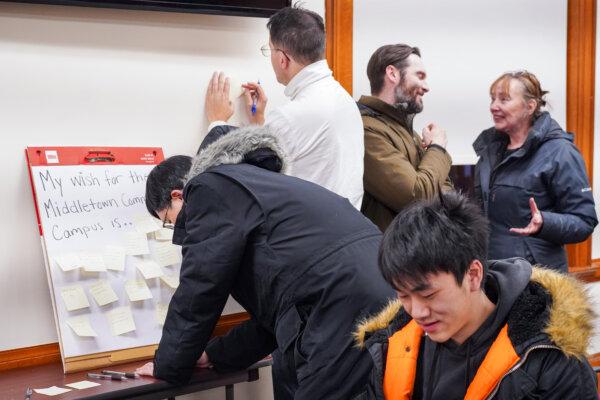 Residents share their thoughts on sticky notes at a public meeting about Middletown Community Campus in Middletown, N.Y., on Jan. 16, 2025. (Cara Ding/The Epoch Times)