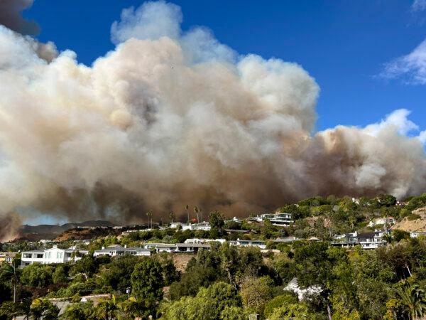 This photo taken by Pacific Palisades resident Darrin Hurwitz shows the Palisades Fire as it approaches homes in Los Angeles on Jan. 7, 2025. (Darrin Hurwitz via AP)