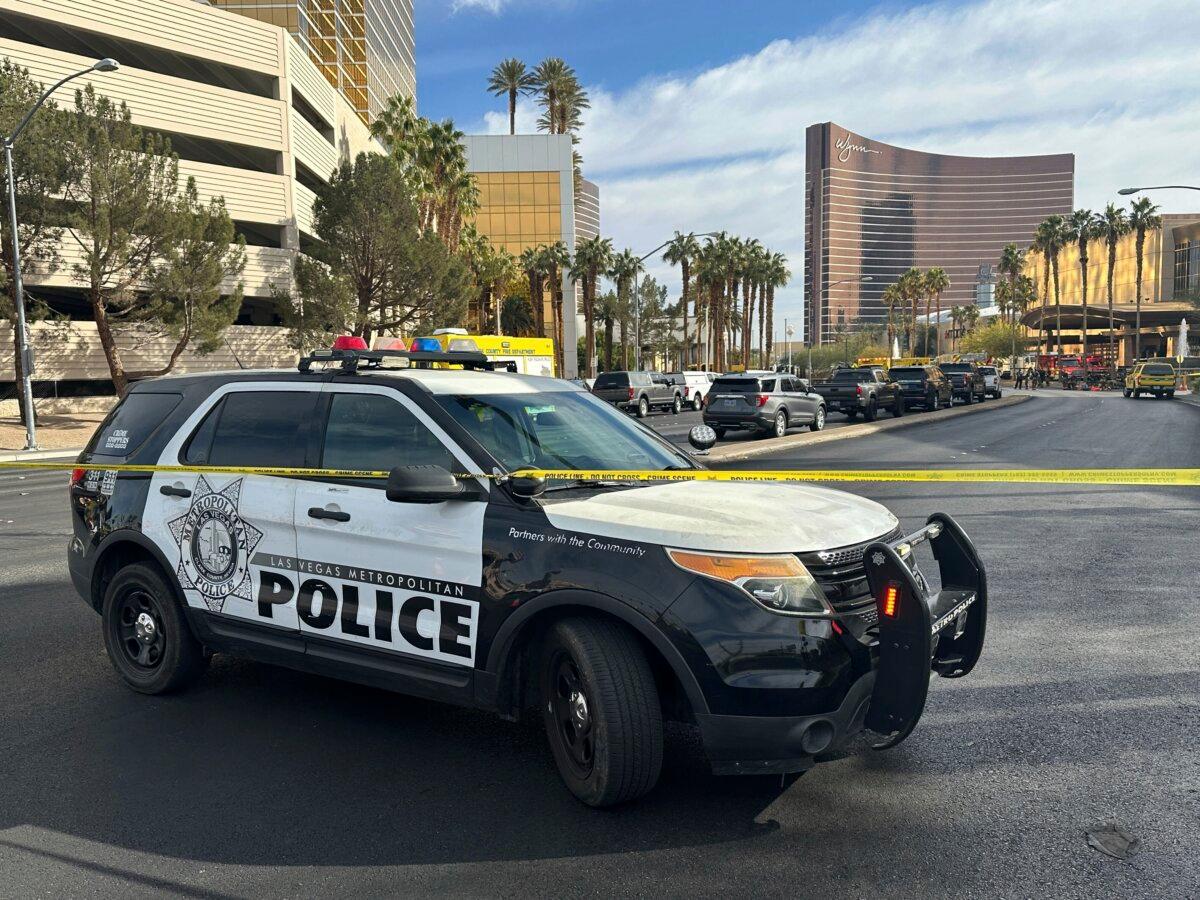 Police block the area after a vehicle exploded outside the lobby of President-elect Donald Trump's hotel in Las Vegas on Jan. 1, 2025. (Ty O'Neil/AP Photo)