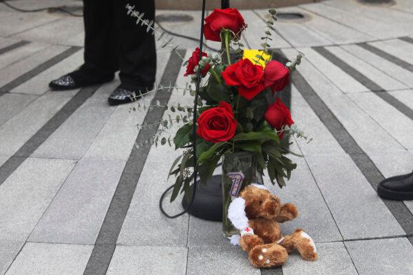 A donated vase of red roses honors victims of the deadly collision between a passenger airliner and an Army helicopter, at the Law Enforcement Memorial in Wichita, Kan., on Jan. 30, 2025. (John Hanna/AP Photo)