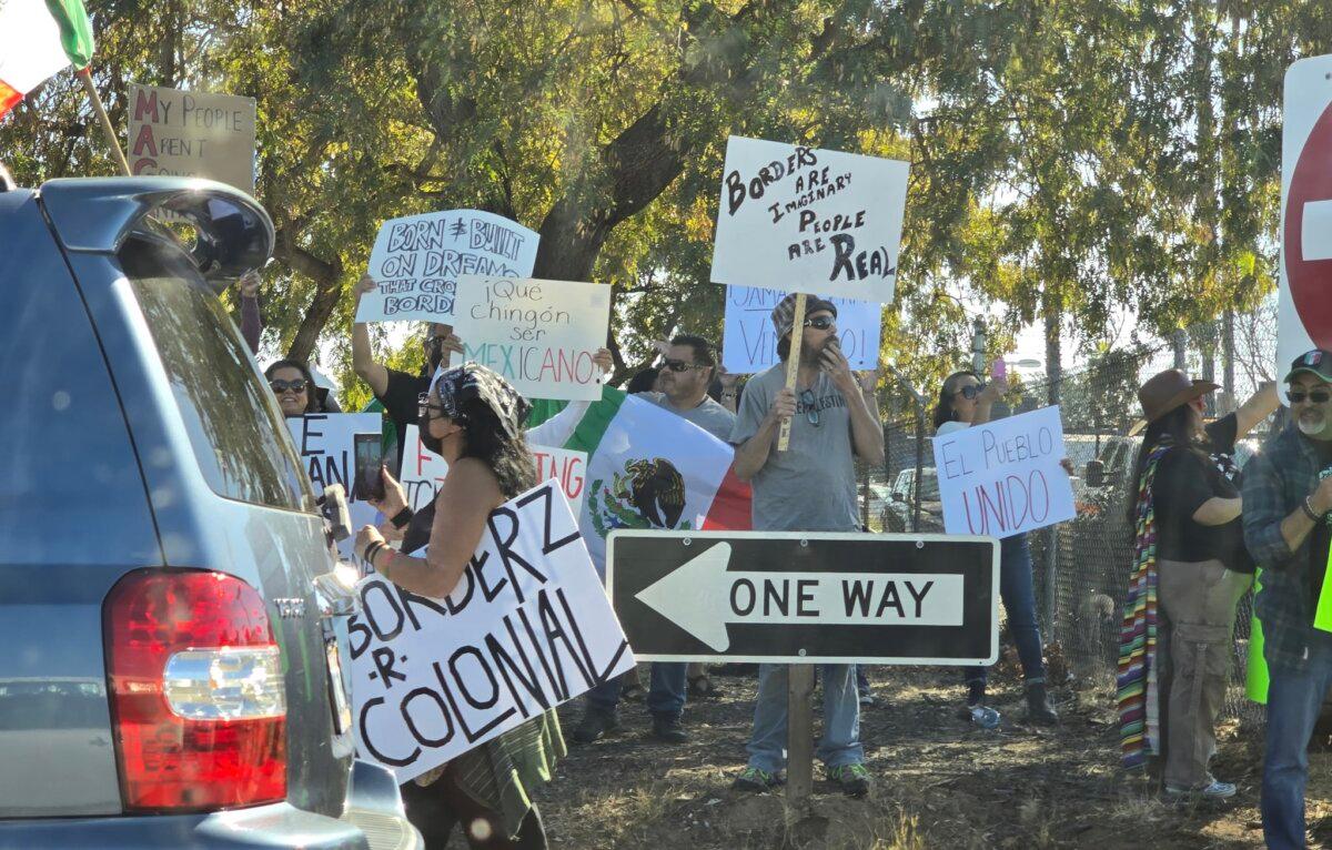 Protesters oppose the Trump administration’s border policies in Escondido, Calif., on Feb. 2, 2025. (Audra Morgan/Eye of the Storm)