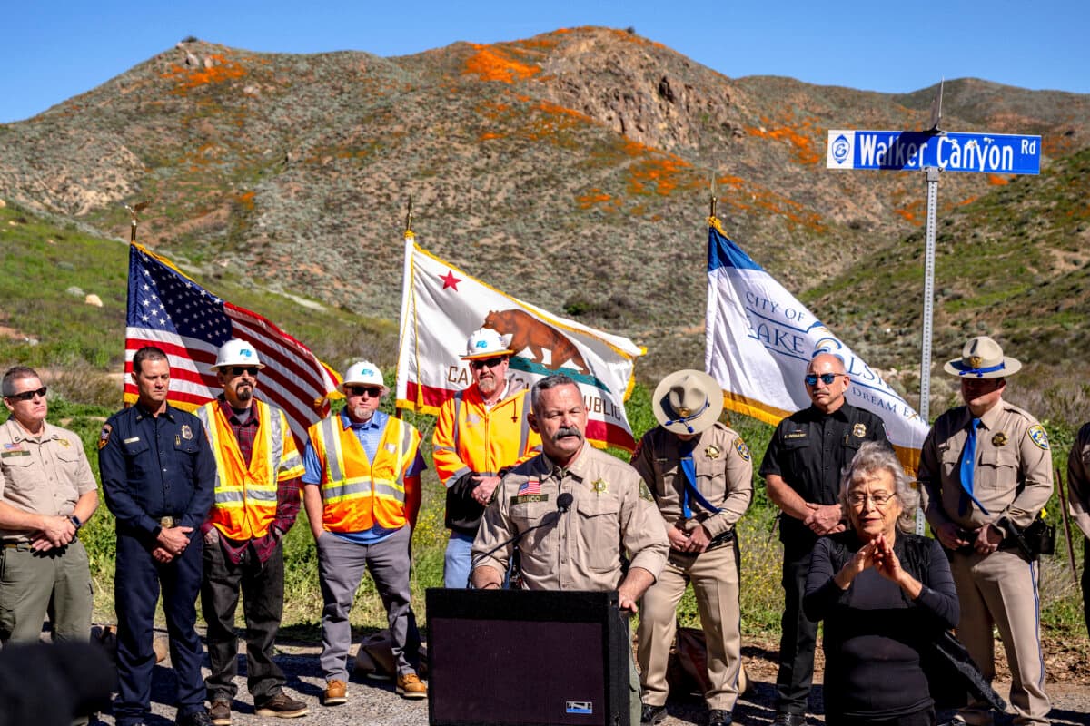 Riverside County Sheriff Chad Bianco speaks at a news conference in Lake Elsinore, Calif., on Feb. 7, 2023. Officials announced the closure of poppy fields at Walker Canyon until the wildflower bloom subsides. (Watchara Phomicinda/The Orange County Register via AP)
