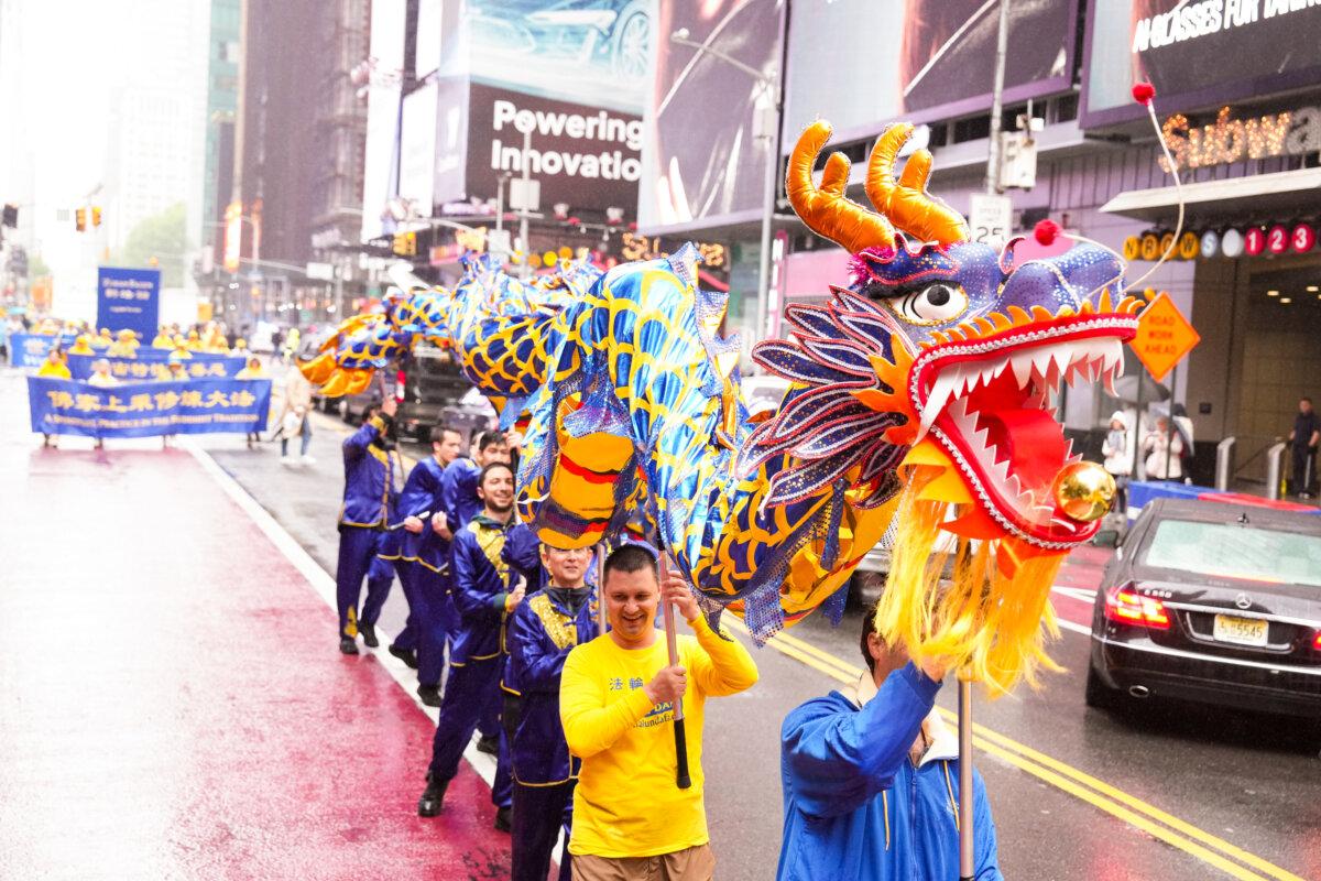 Falun Gong practitioners take part in a parade to celebrate World Falun Dafa Day in New York City on May 9, 2025. (Larry Dye/The Epoch Times)