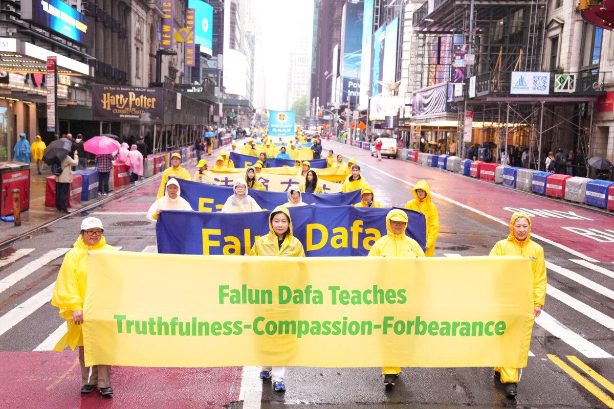 Falun Gong practitioners take part in a parade to celebrate World Falun Dafa Day in New York City, on May 9, 2025. (Larry Dye/The Epoch Times)