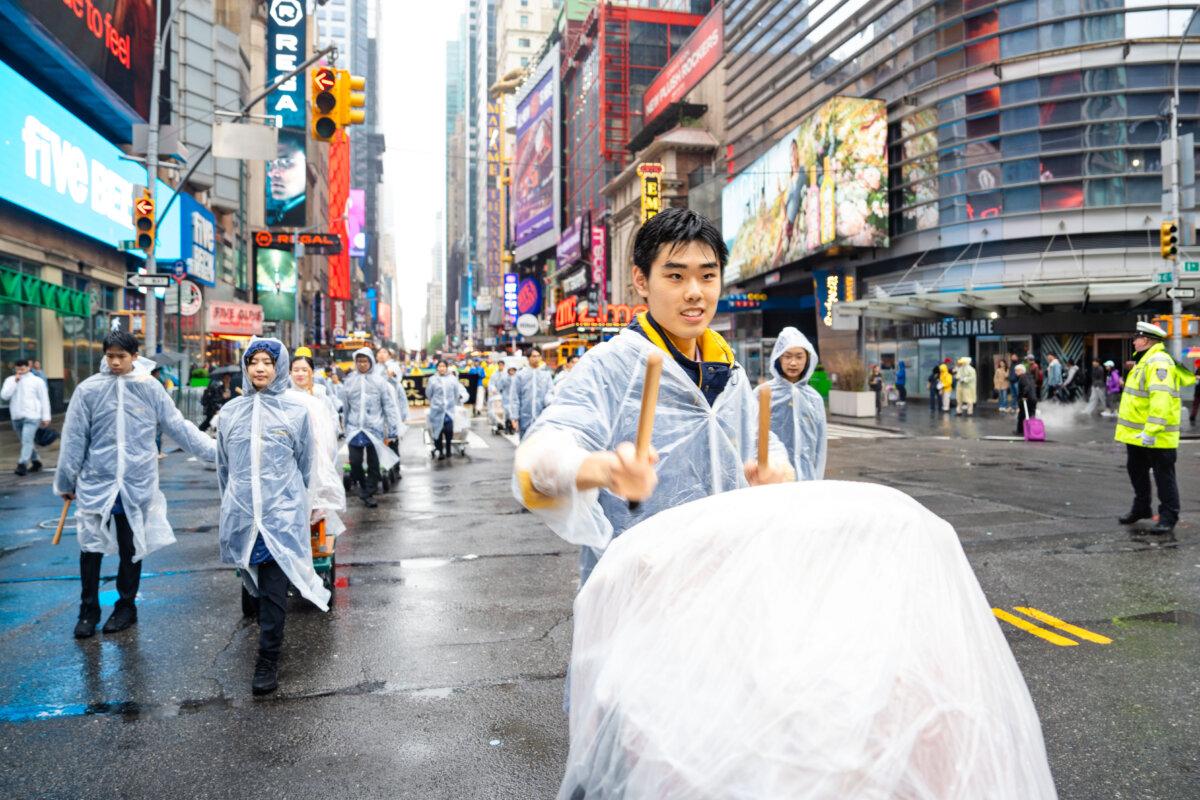 Falun Gong practitioners take part in a parade to celebrate World Falun Dafa Day and call for an end of the persecution in China, in New York City, on May 9, 2025. (Samira Bouaou/The Epoch Times)