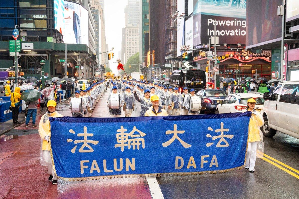 Falun Gong practitioners take part in a parade to celebrate World Falun Dafa Day and call for an end of the persecution in China, in New York City, on May 9, 2025. (Samira Bouaou/The Epoch Times)