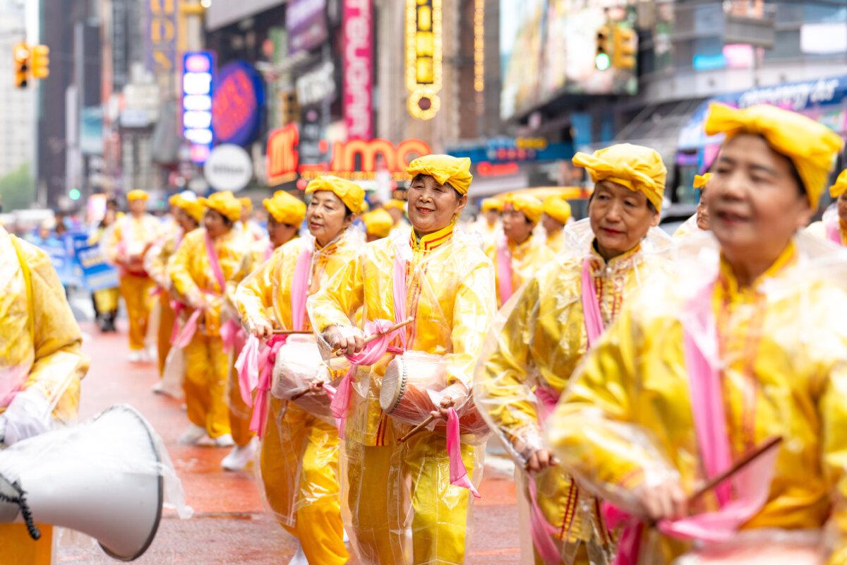 Falun Gong practitioners take part in a parade to celebrate World Falun Dafa Day and call for an end of the persecution in China, in New York City, on May 9, 2025. (Samira Bouaou/The Epoch Times)