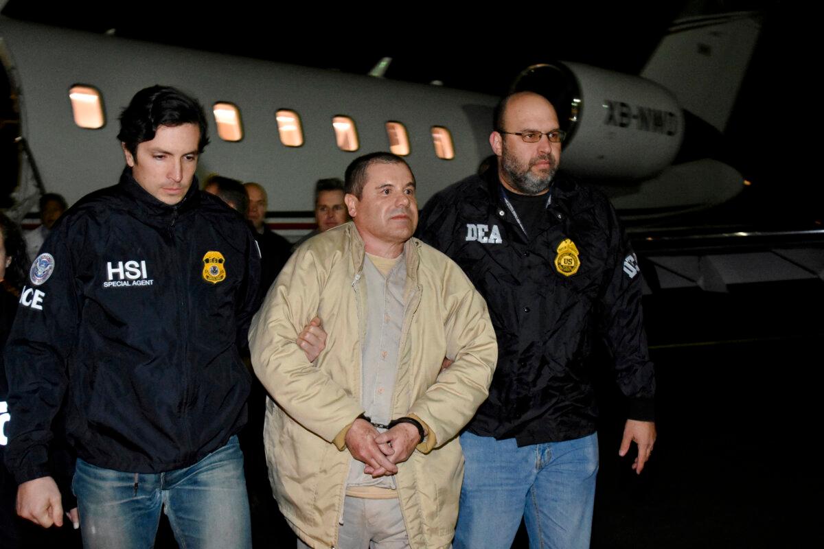 Mexican drug lord Joaquín “El Chapo” Guzmán arrives at Long Island MacArthur Airport in Ronkonkoma, N.Y., after his extradition from Mexico, on Jan. 19, 2017. (U.S. officials/handout via Reuters)