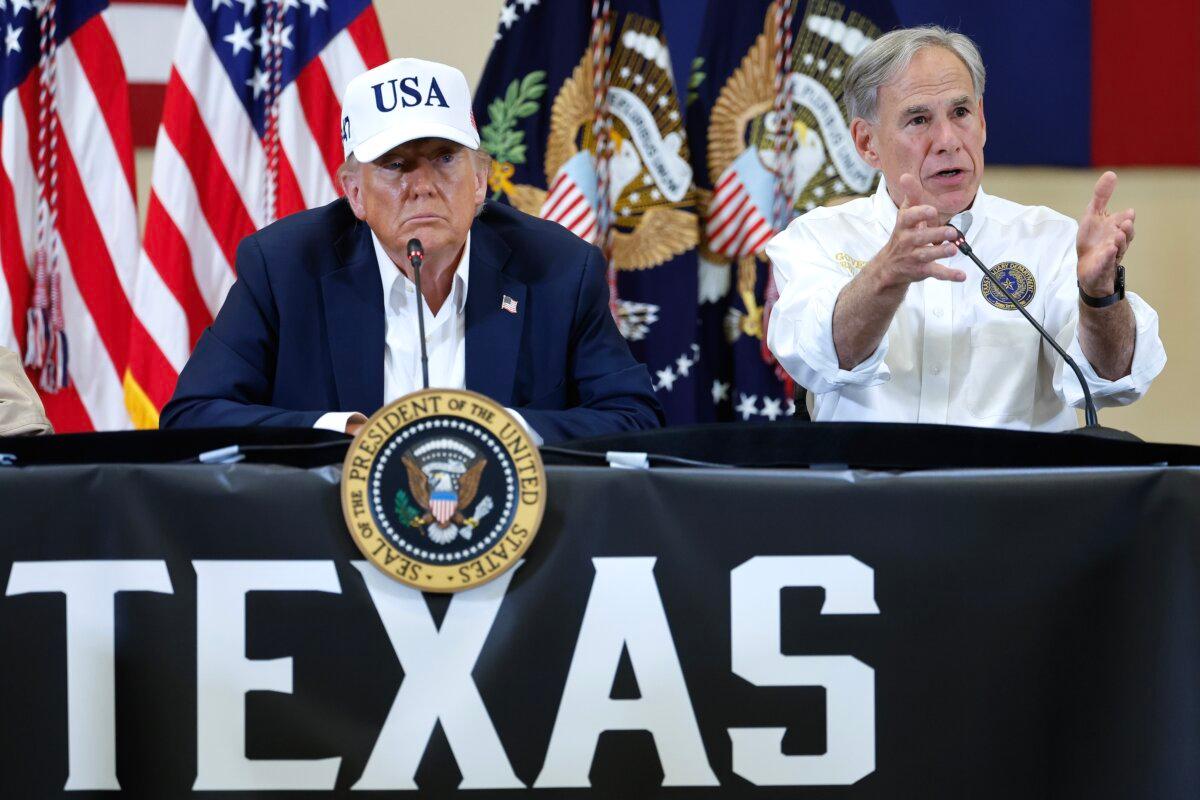 President Trump with Texas Gov. Greg Abbott in Kerrville, Texas, on July 11, 2025. (Chip Somodevilla/Getty Images)