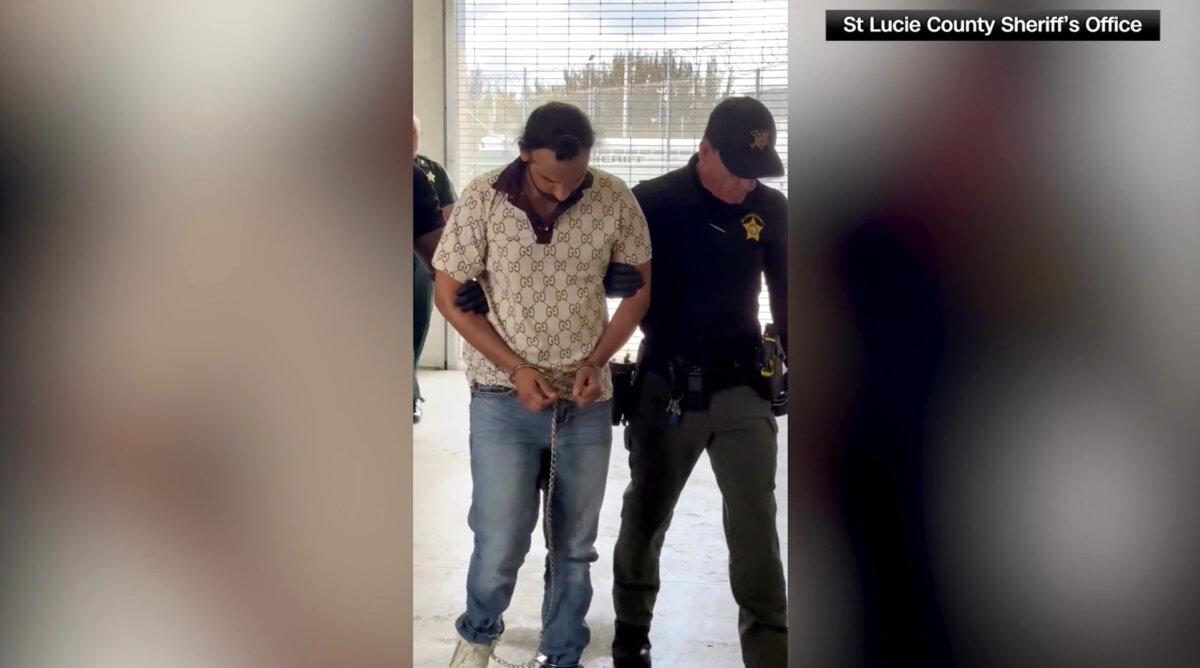 Harjinder Singh, the truck driver in a fatal crash on Florida's Turnpike on Aug. 12, is escorted in St. Lucie County Jail in St. Lucie County, Fla., on Aug. 23, 2025, in a still from video. (St. Lucie County Sheriff's Office)