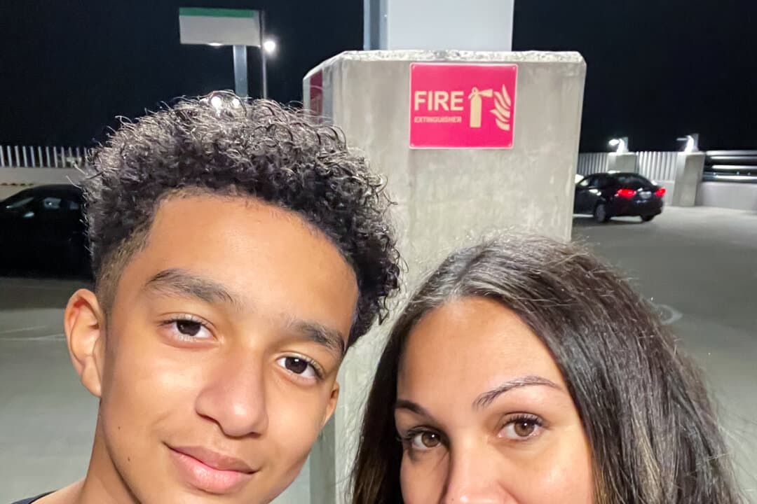 Megan Garcia stands with her son, Sewell Setzer, in an undated photo. Sewell, 14, died in 2024 after his Character.AI chatbot companion allegedly encouraged him to take his own life. (Courtesy of Megan Garcia via AP)