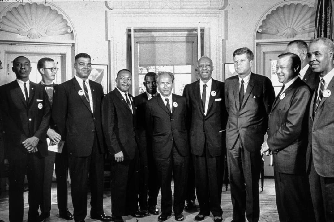 President John F. Kennedy (3rd R) in the White House with leaders of the “March on Washington” (L–R) Floyd McKissick, Mathew Ahmann, Whitney Young, Martin Luther King Jr., John Lewis, Rabbi Joachim Prinz, A. Philip Randolph, Walter Reuther, and Roy Wilkins. (MPI/Getty Images)