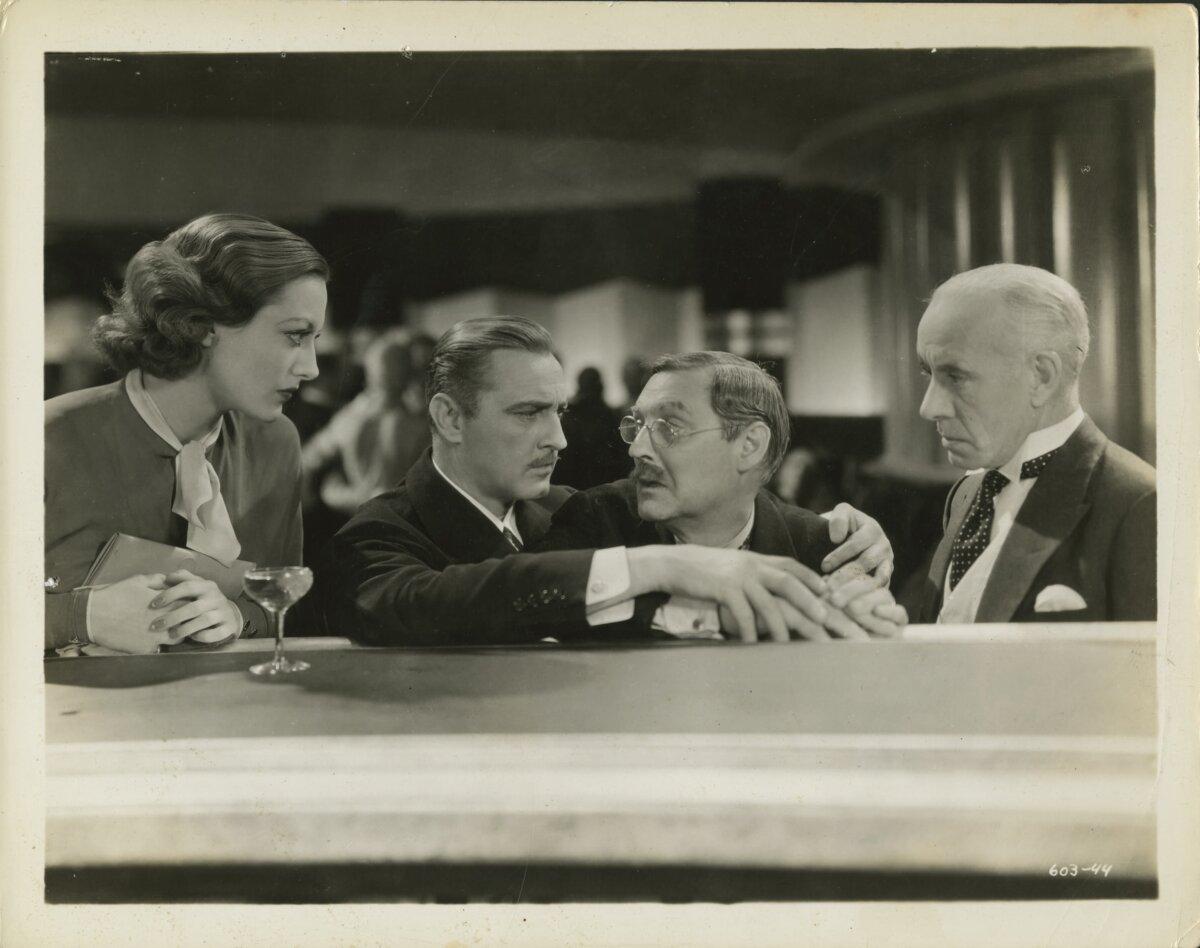 (L–R) Flammchen (Joan Crawford), Baron Felix von Geigern (John Barrymore), Otto Kringelein (Lionel Barrymore), and Doctor Otternschlag (Lewis Stone), in “Grand Hotel.” (Metro-Goldwyn-Mayer/MovieStillsDB)