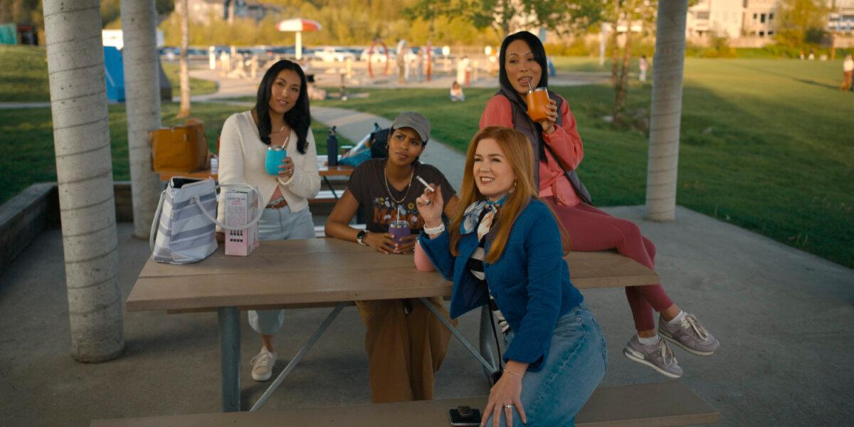 (L–R) Lauren Akemi Bradley, Sarah Surh, Isla Fisher, and Sabrina Dhowre Elba on the set of “Playdate.” (Amazon MGM Studios/MovieStillsDB)