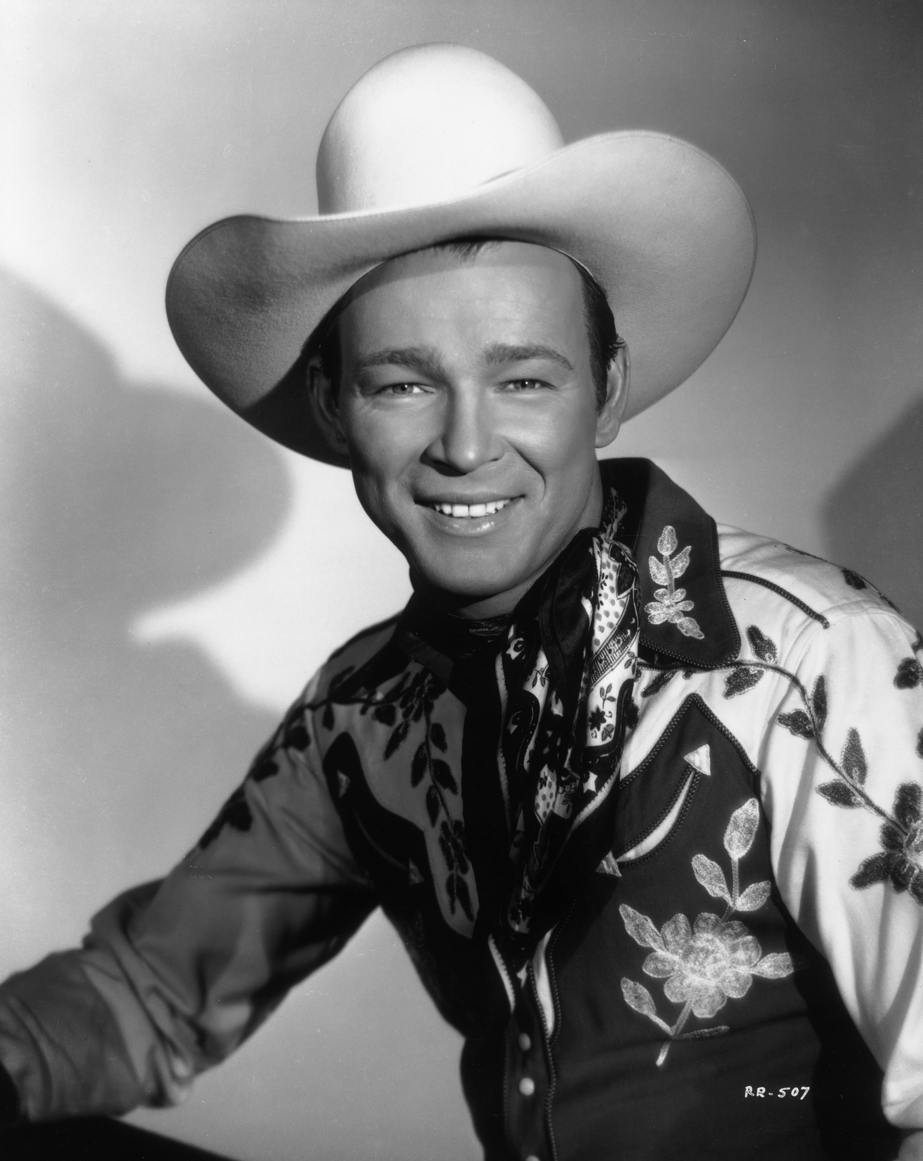 Studio portrait of American actor and country singer Roy Rogers wearing his signature white Stetson cowboy hat, circa 1945. (Hulton Archive/Getty Images)