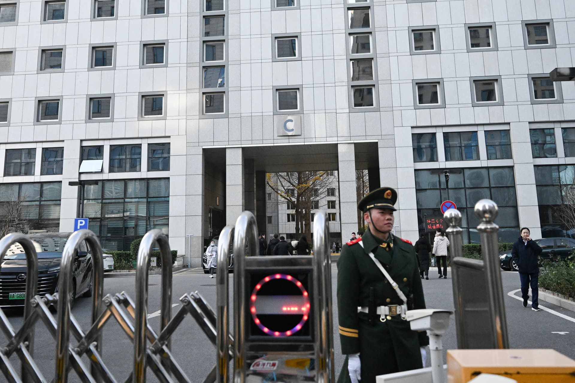 A paramilitary police officer stands guard outside a building of the Foreign Ministry in Beijing on Nov. 18, 2025. (Pedro Pardo/AFP via Getty Images)