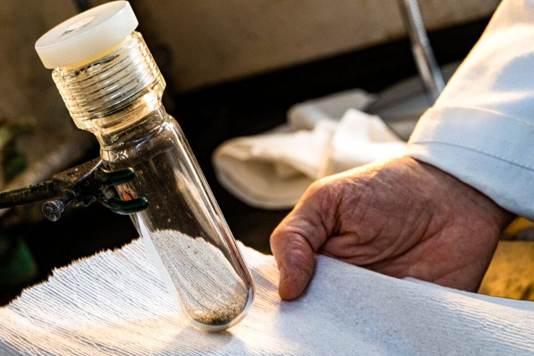 (Top) The innovative research builds on Tour’s 2020 development of waste disposal and upcycling applications using flash Joule heating. (Bottom) A vial holds metals that have been separated from other components in a crushed circuit board through flash Joule heating in a Rice University laboratory. (James Tour's Lab/Rice University, Jeff Fitlow/Rice University)