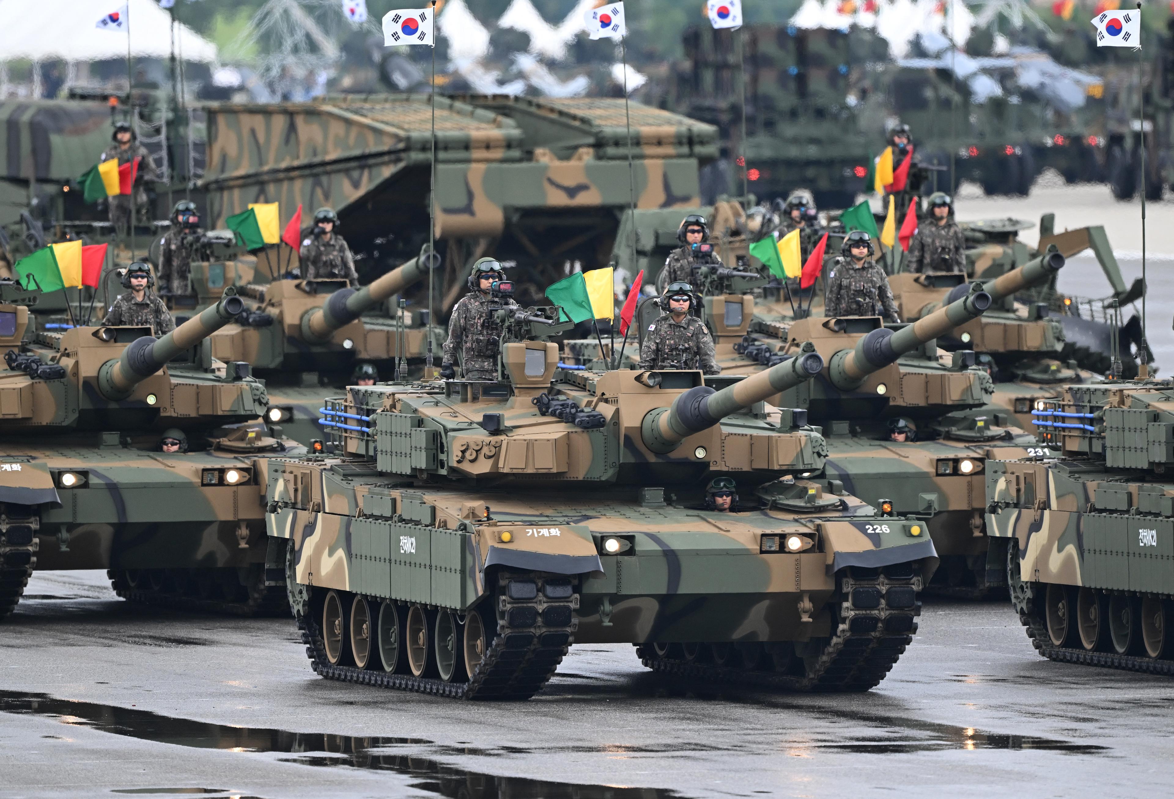 Visitors watch South Korea's K2 tank during a ceremony to mark the 76th anniversary of Korea Armed Forces Day at Seoul Air Base in Seongnam on Oct. 1, 2024. (Jung Yeon-je/AFP via Getty Images)