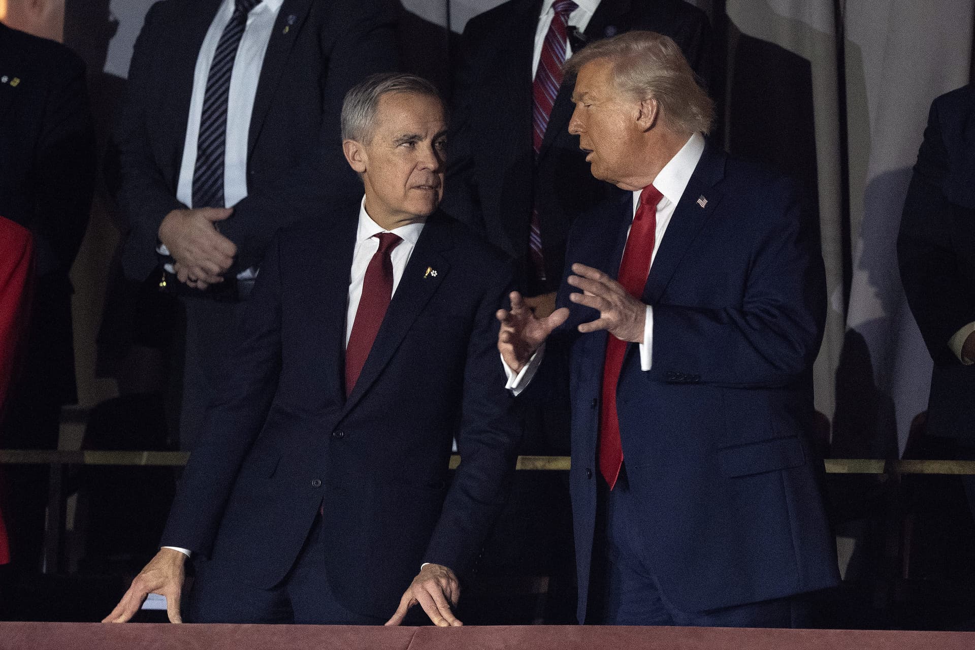 Canadian Prime Minister Mark Carney and U.S. President Donald Trump speak before the FIFA World Cup draw at the Kennedy Center in Washington on Dec. 5, 2025. (The Canadian Press/Adrian Wyld)